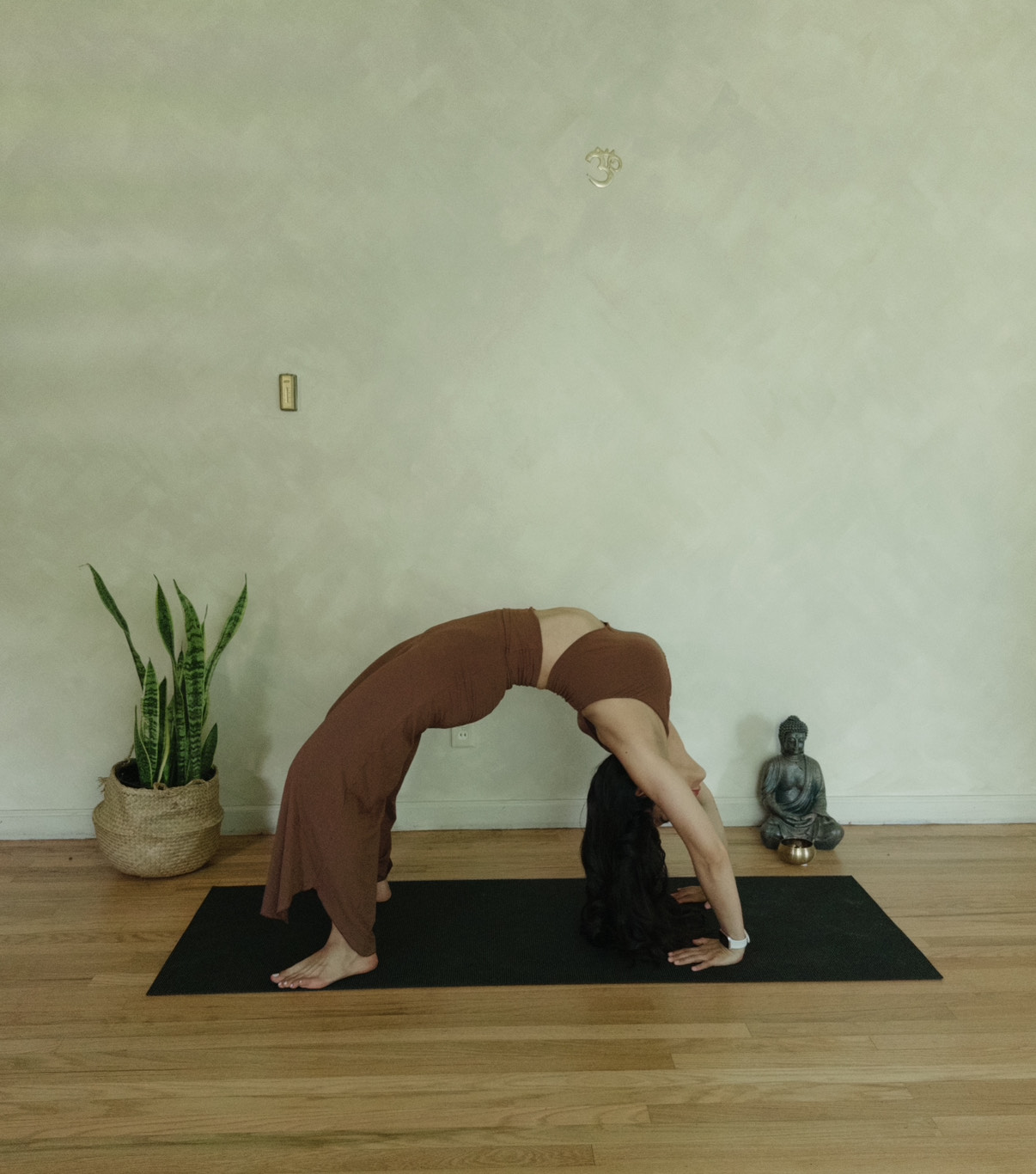 Instructor demonstrating yoga pose